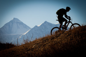 Alex Glasgow, Mandil Pradhan and Euan Wilson mountain biking around Kathmandu and the lower Mustang Valley in Nepal.