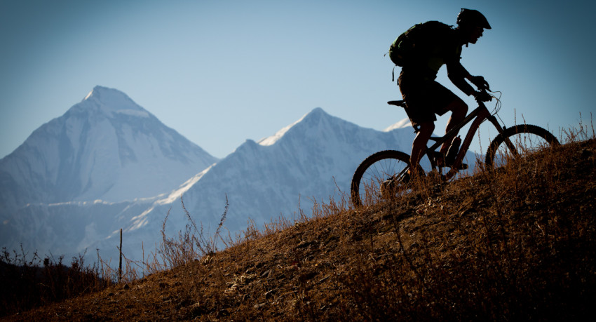 Alex Glasgow, Mandil Pradhan and Euan Wilson mountain biking around Kathmandu and the lower Mustang Valley in Nepal.